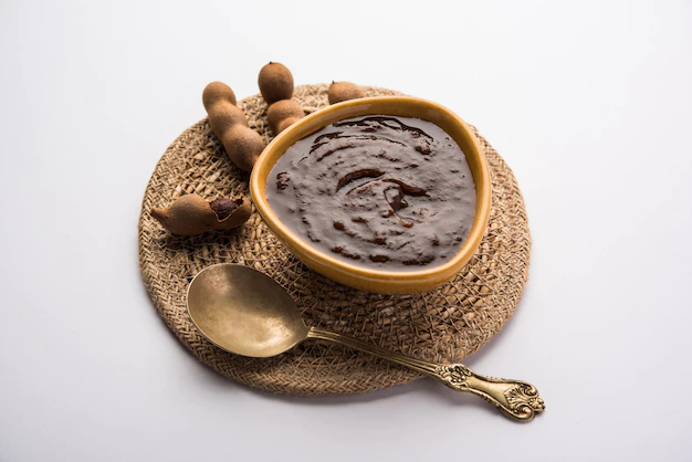 tamarind-imli-fresh-puree-paste-from-pulp_466689-19328.webp